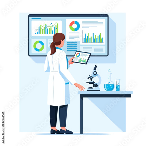 Scientist analyzing data on screen and tablet in lab