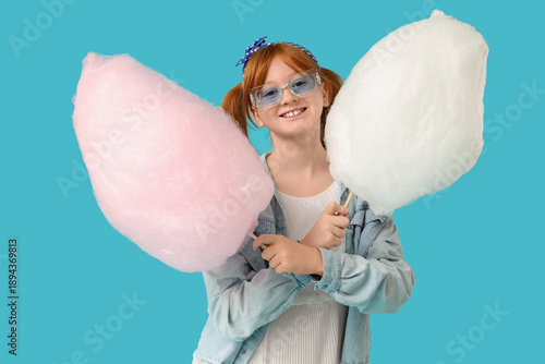 Teen girl with two sticks o...
