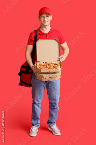 Male courier with bag and p...