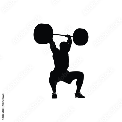 Silhouette of weightlifter lifting barbell overhead