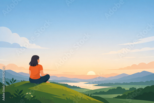 Woman sitting on hill watching distant horizon