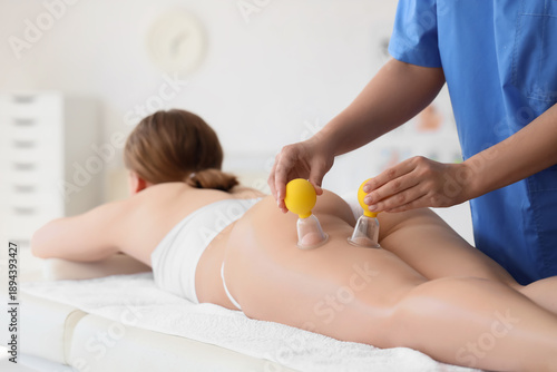 Young woman getting anti-ce...