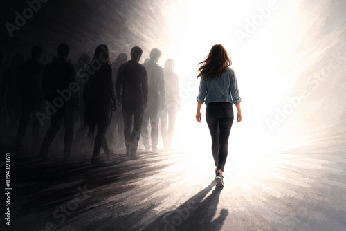 Woman walking from shadows toward illuminated path