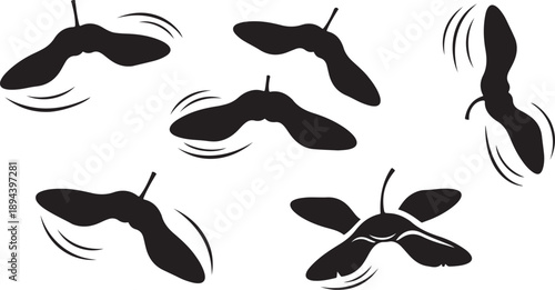 Spinning Black Fan Blades in Motion on White Background