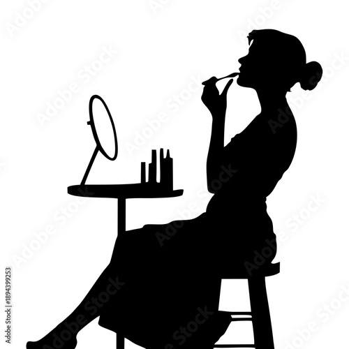 Black silhouette of a woman applying makeup at a dressing table