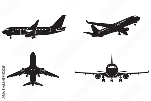 Four black silhouettes of airplanes in different views on a white background