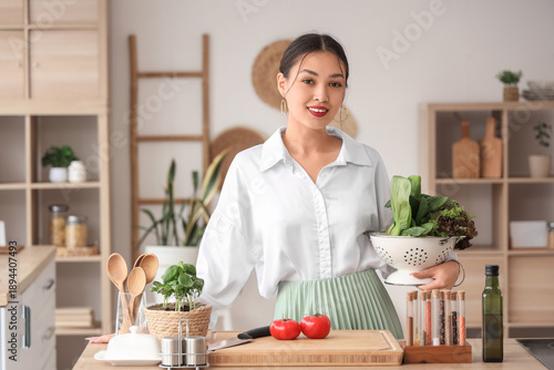 Beautiful young happy Asian...