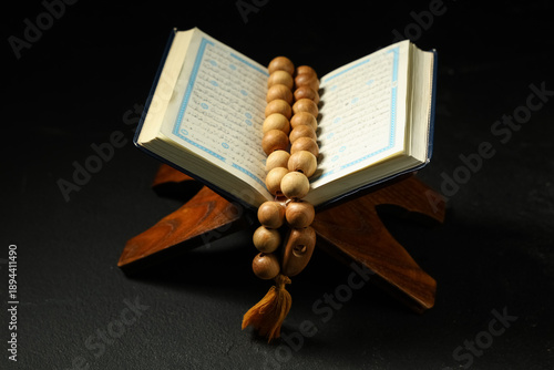 Wooden stand with Koran and...
