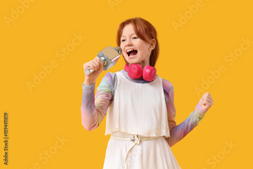 Teenage redhead girl with m...