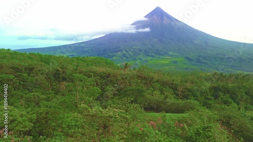 The majestic Mayon Volcano rising above lush tropical jungles in Albay, Philippines