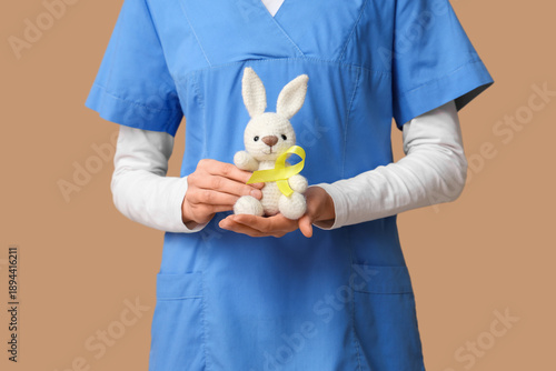 Female doctor with toy bunn...