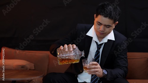  businessman holding whiskey, a restaurant