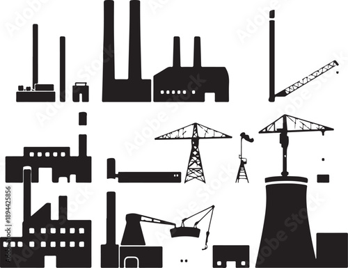 Dramatic silhouette of an industrial factory complex with smokestacks rising against a clear sky