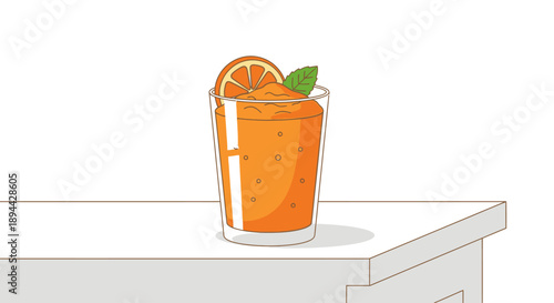 Refreshing orange juice with a slice of orange and mint.