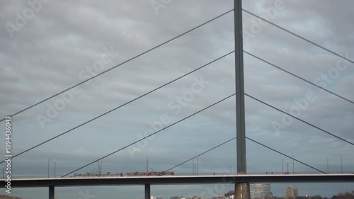 Oberkasseler Brücke in Düsseldorf with U-Bahn, traffic and pedestrians