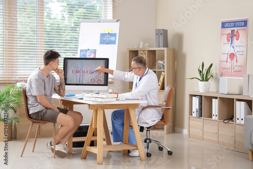 Mature urologist working wi...