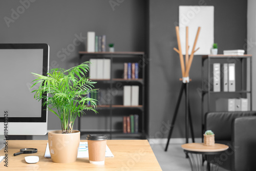 Houseplant and cup of coffe...