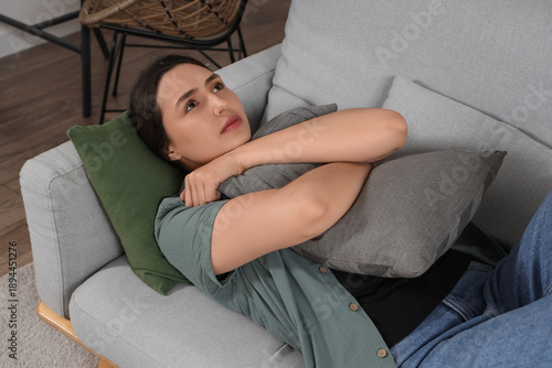 Depressed young woman with ...