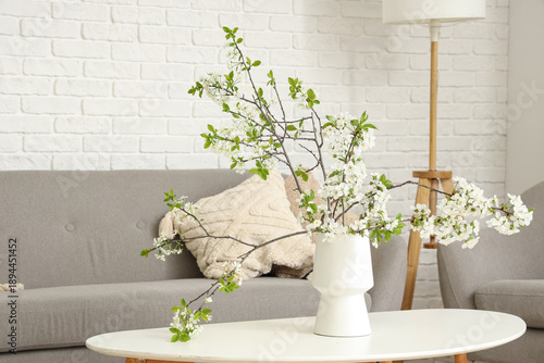Vase with blooming branches...