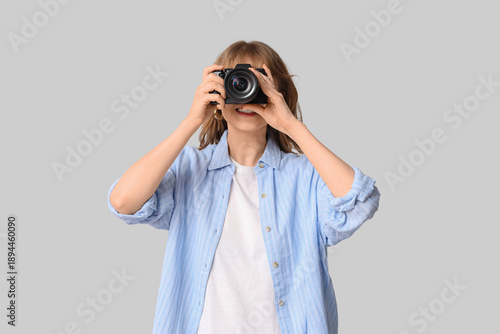 Beautiful young woman takin...