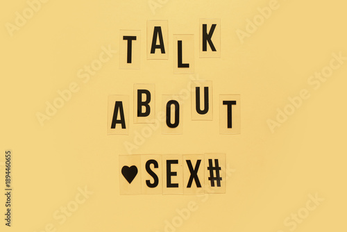 Letters with text TALK ABOU...