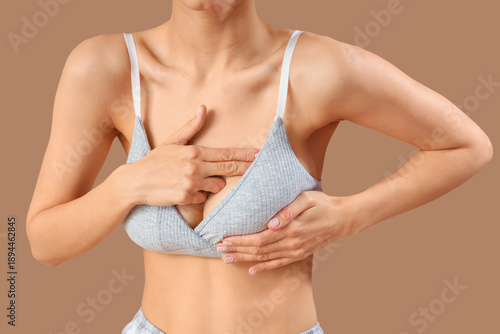 Young woman checking her br...