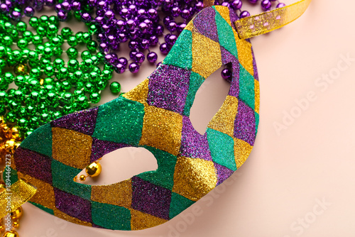 Shiny carnival mask with de...