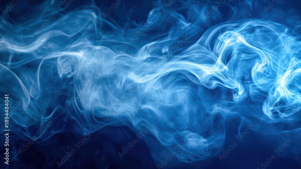Fototapeta premium Ethereal Blue Smoke Swirls on Dark Background for Abstract Design