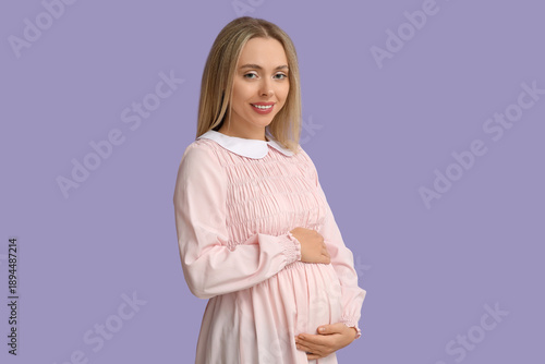 Happy pregnant woman on lil...