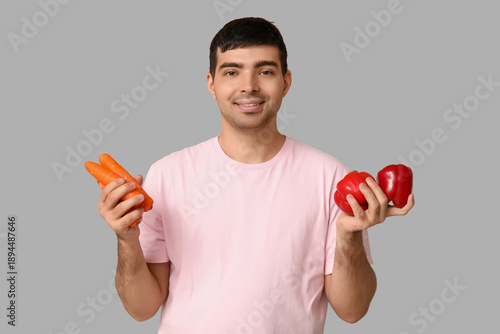 Young man with vegetables r...