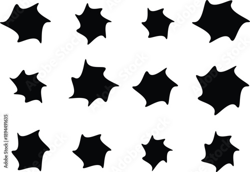 Multiple black silhouette forms with jagged edges evenly distributed across a bright clean surface