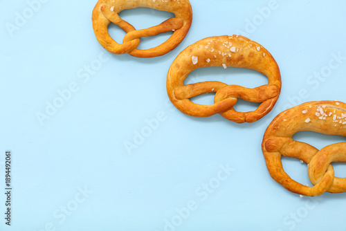 Soft pretzels on blue backg...