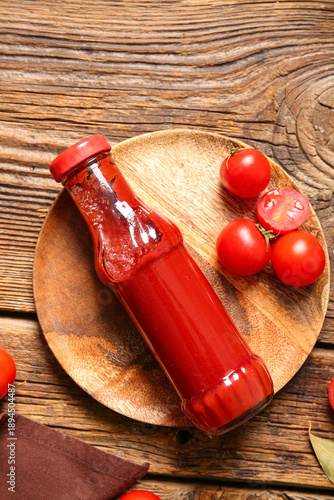 Plate with glass bottle of ...
