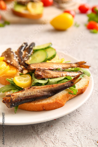 Plate of tasty sandwiches w...
