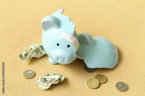 Broken patched piggy bank w...