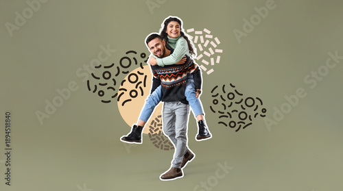 Happy young couple in warm sweaters on color background