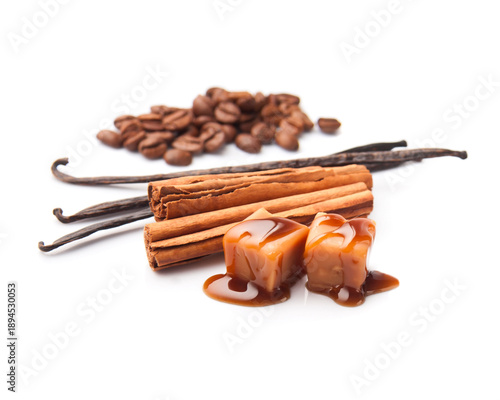 Cinnamon pods and canilla stick with caramel candy topping