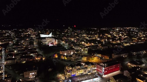 Wallpaper Mural Aerial nighttime view of the port city of Kristiansund on the northwest coast of Norway, brightly lit by street lamps. Torontodigital.ca