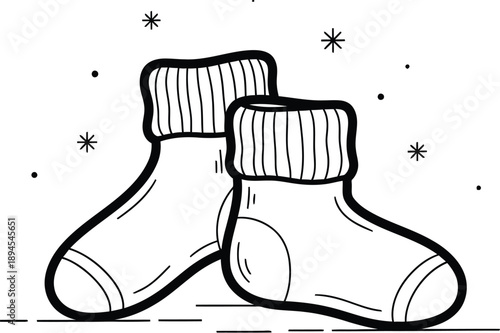 Simple black and white line art illustration featuring a cozy pair of rolled cuff winter socks resting gently surrounded by tiny abstract floating snowflakes and dots.