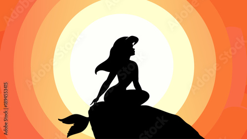 Mermaid silhouette sitting on rock with flowing hair in sunset