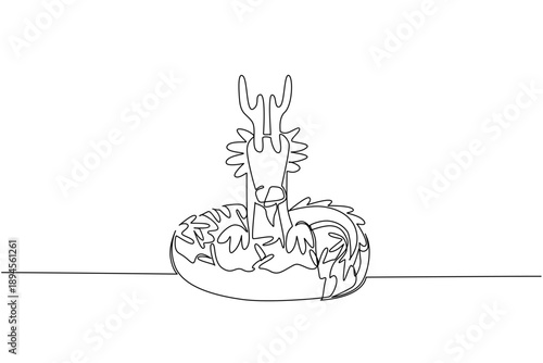 Single line drawing of fantasy legendary dragon shows cute animal sitting inside donut for food concept. Unique design features mythical beast for kids stationery purpose in minimalist style art