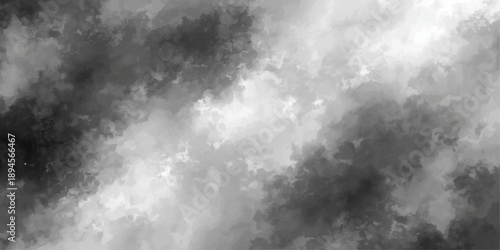 Abstract black and white background featuring dark storm clouds and a motion texture of smoke and mist across a dramatic nature sky