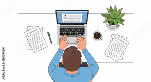 Overhead view of a person diligently working on a laptop at a neat office desk, preparing a professional resume or job application document