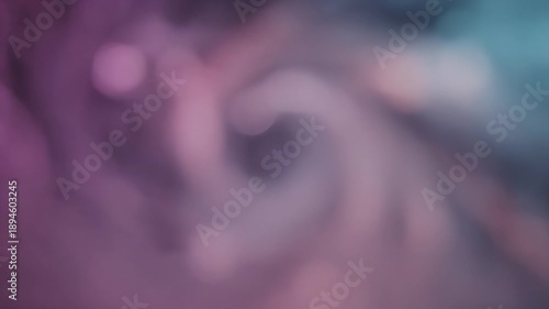 Abstract blurred background with pink and blue colors, artistic design.