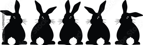 Set of Five Cute Black Rabbit Silhouettes Featuring Different Ear Poses and Fluffy White Tails Isolated on White Background for Easter and Nature Designs