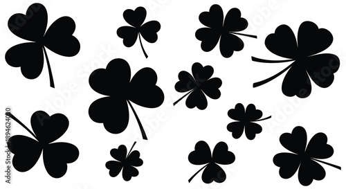 A collection of black four leaf clovers in various sizes and rotations on transparent background silhouette high quality professional detailed modern elegant