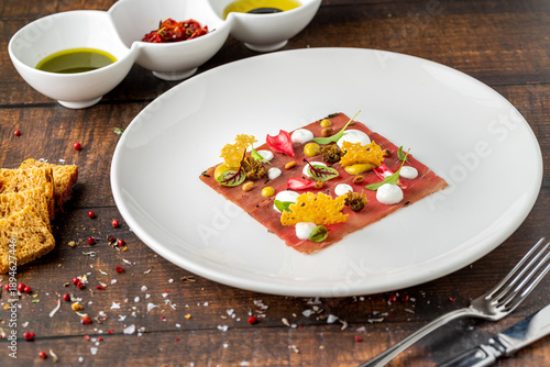 Wallpaper Mural Modern Italian carpaccio plate with artistic fine dining presentation Torontodigital.ca