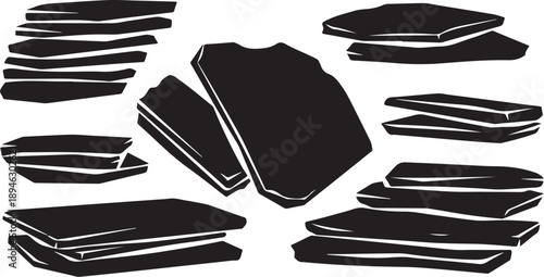 Stacks of folded black clothes on white background illustration