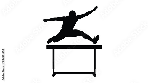 Dynamic Silhouette of a Track and Field Athlete Clearing a Hurdle Representing Determination and Athletic Excellence
