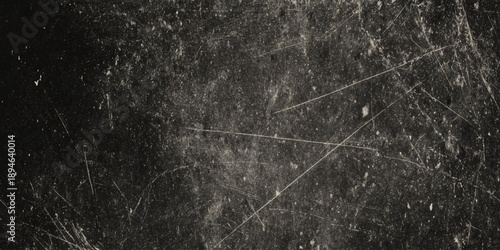 grunge old stained black distressed wall textured image of a dirty surface with scratches and marks on it looking worn out and weathered	